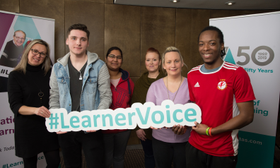 students holding #Learner Voice