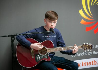 Adam O'Hanlon from Dundalk Youth Centre playing at the launch of the LMETB Youth Work Plan